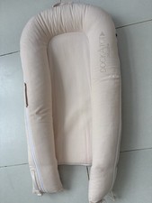 Dockatot Deluxe+ pink & white
